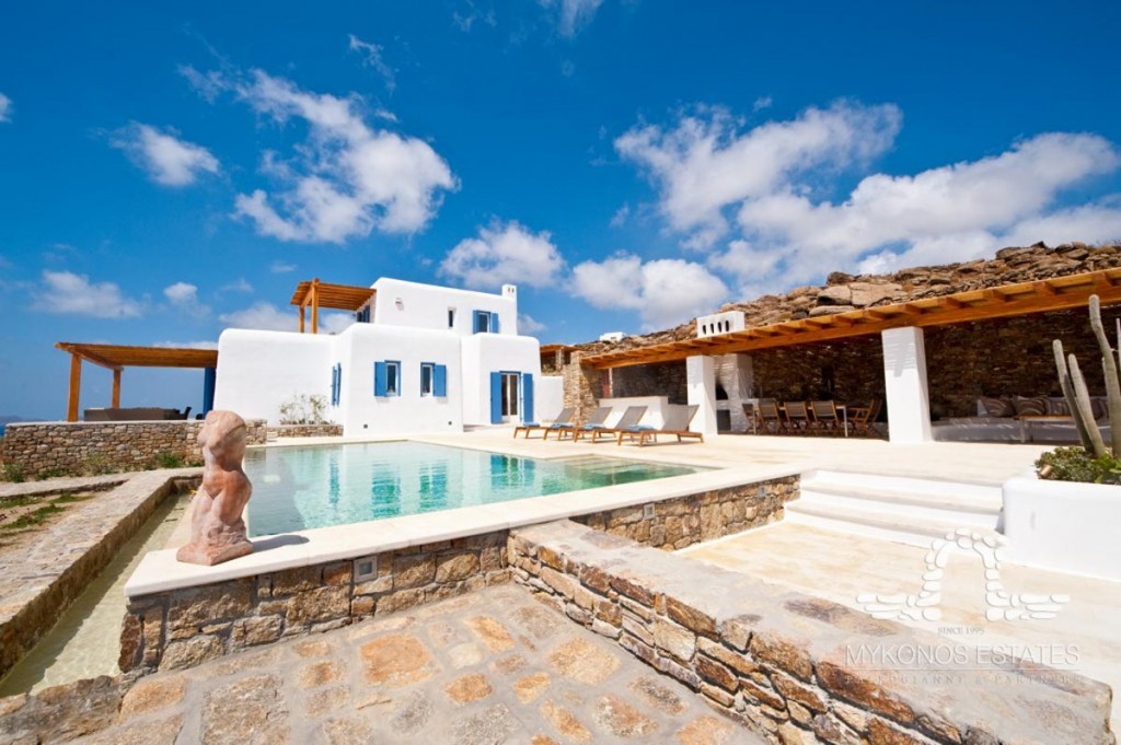 Pool and white villa with pergola at Villa Judith in Pirgi, Mykonos