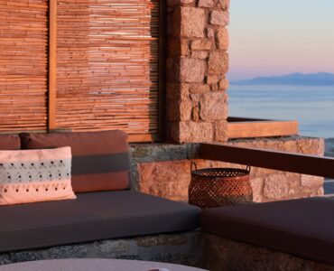 Outdoor daybed with sea view at Villa Alabaster, Kounoupas, Mykonos