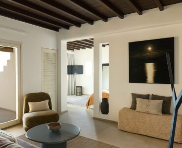 Sitting area with sea-view doors at Villa Alabaster, Kounoupas, Mykonos