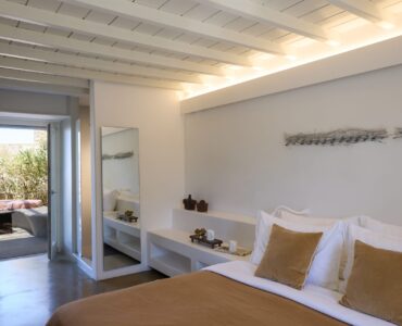 Double bedroom with private terrace door at Villa Sunstone, Kounoupas, Mykonos