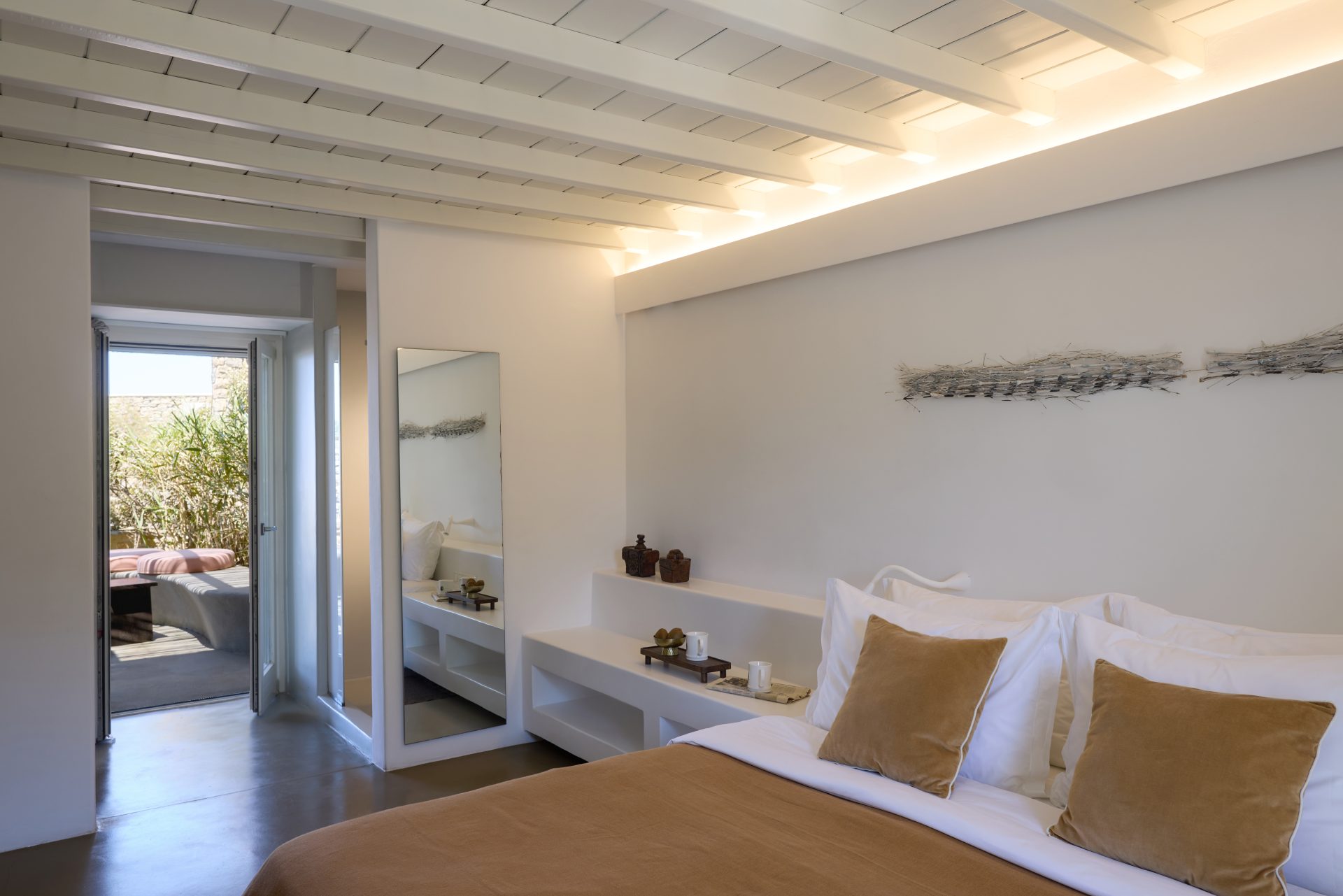 Double bedroom with private terrace door at Villa Sunstone, Kounoupas, Mykonos