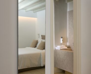 Bedroom mirror and dressing area at Villa Amethyst, Kounoupas, Mykonos