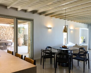 Dining area opening to the terrace at Villa Amethyst, Kounoupas, Mykonos