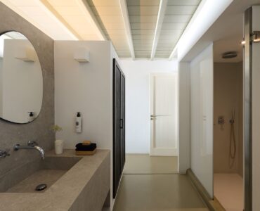 Bathroom vanity and hallway at Villa Ammolite, Kounoupas, Mykonos