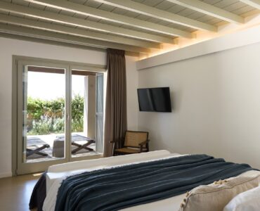 Double bedroom with terrace doors at Villa Ammolite, Kounoupas, Mykonos