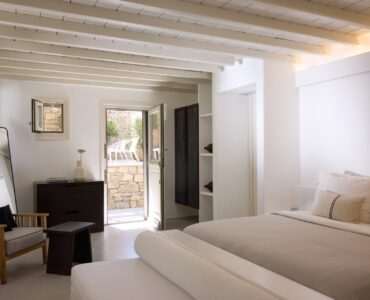 Double bedroom with garden access at Villa Moonstone, Kounoupas, Mykonos