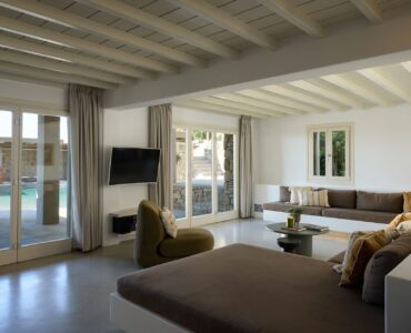 Living room with pool view at Villa Moonstone, Kounoupas, Mykonos