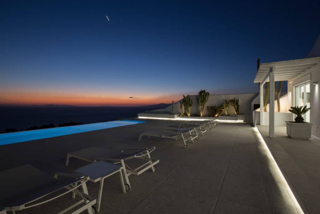 Infinity pool terrace at sunset at Stigma Elegant in Evagelistraki, Mykonos
