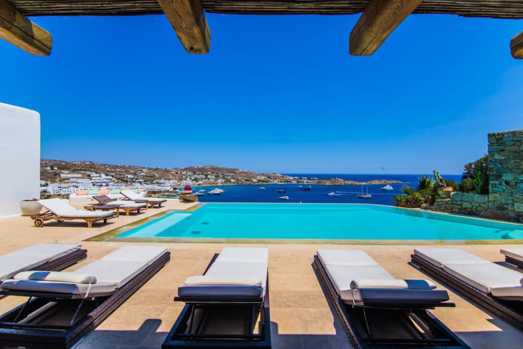 Pool with sunbeds and sea view at Villa Arimneste in Agios Lazaros, Mykonos