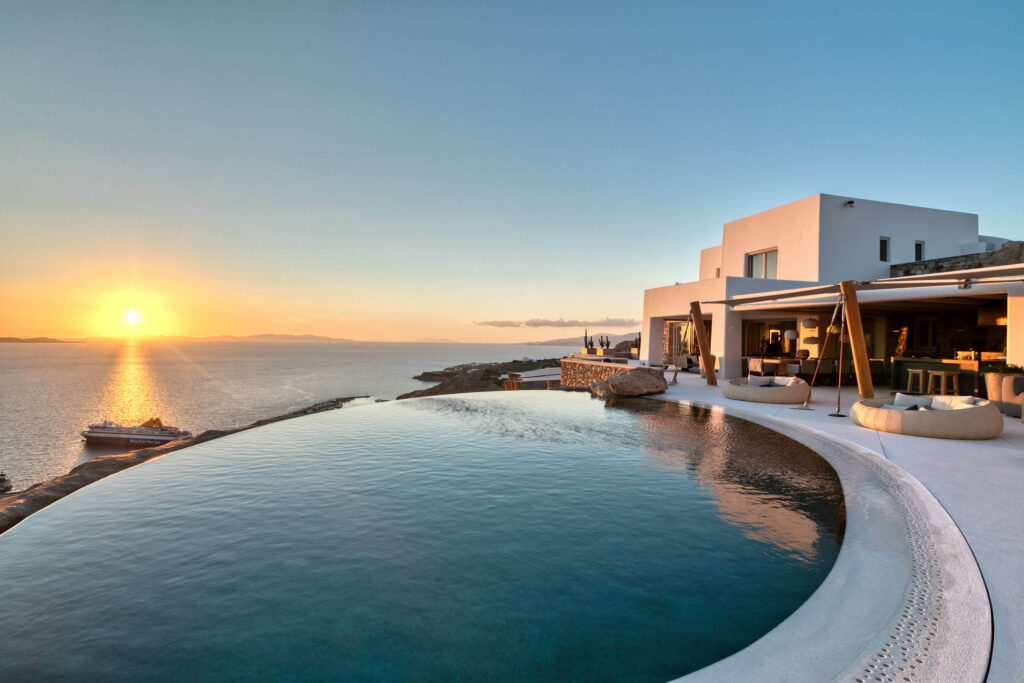 Pool terrace at sunset at Villa Panthea in Agia Sofia, Mykonos