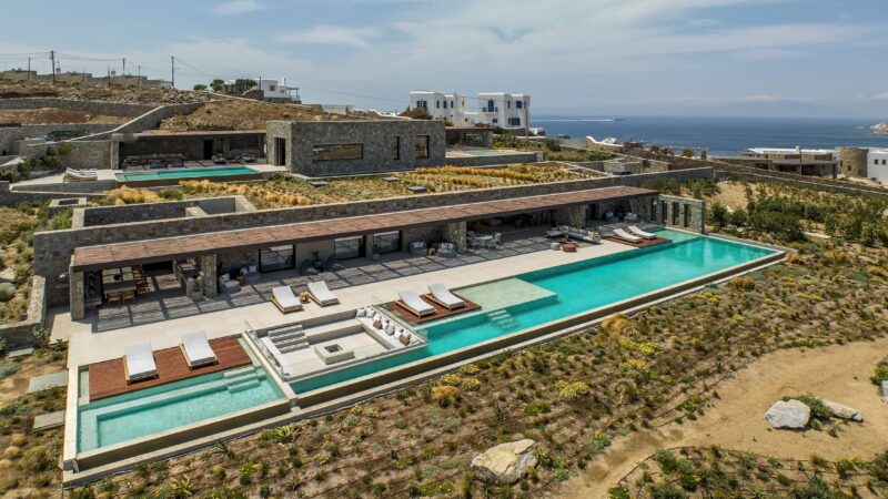 Aerial view of the villa, pools and surrounding Aleomandra landscape at Aether Private Retreat - Grand Villa, Aleomandra, Mykonos