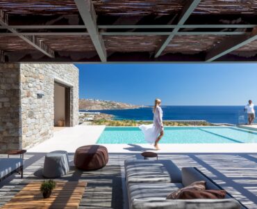 Guests enjoying the pool terrace at Aether Private Retreat - Grand Villa, Aleomandra, Mykonos