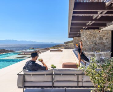 Guests enjoying the pool terrace at Aether Private Retreat - Grand Villa, Aleomandra, Mykonos