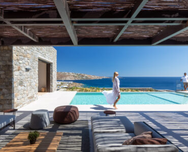Guests enjoying the pool terrace at Aether Private Retreat - Grand Villa, Aleomandra, Mykonos