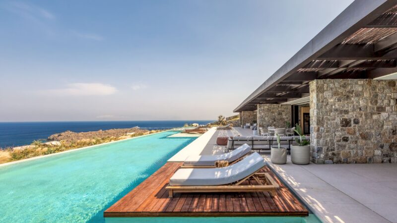 Infinity pool with sun deck and loungers overlooking the Aegean Sea at Aether Private Retreat - Ground Floor, Aleomandra, Mykonos
