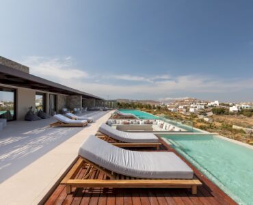 Infinity pool with sun deck and loungers overlooking the Aegean Sea at Aether Private Retreat - Ground Floor, Aleomandra, Mykonos