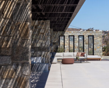 Stone terrace with timber pergola and sea views at Aether Private Retreat - Ground Floor, Aleomandra, Mykonos
