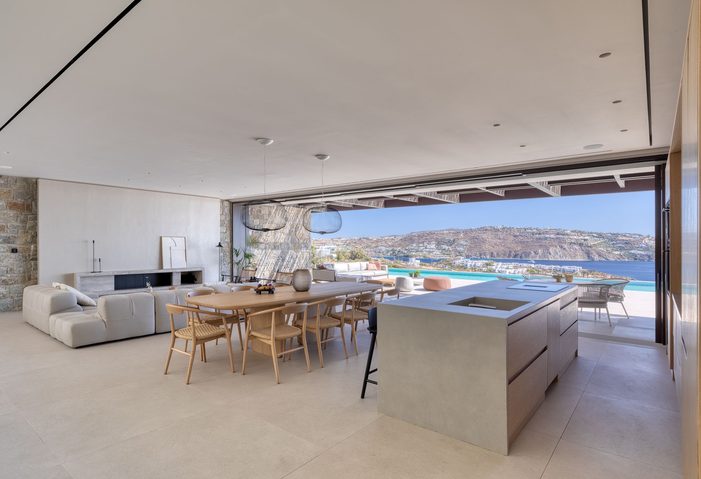 Open-plan living and dining area with floor-to-ceiling sea views at Aether Private Retreat - Ground Floor, Aleomandra, Mykonos