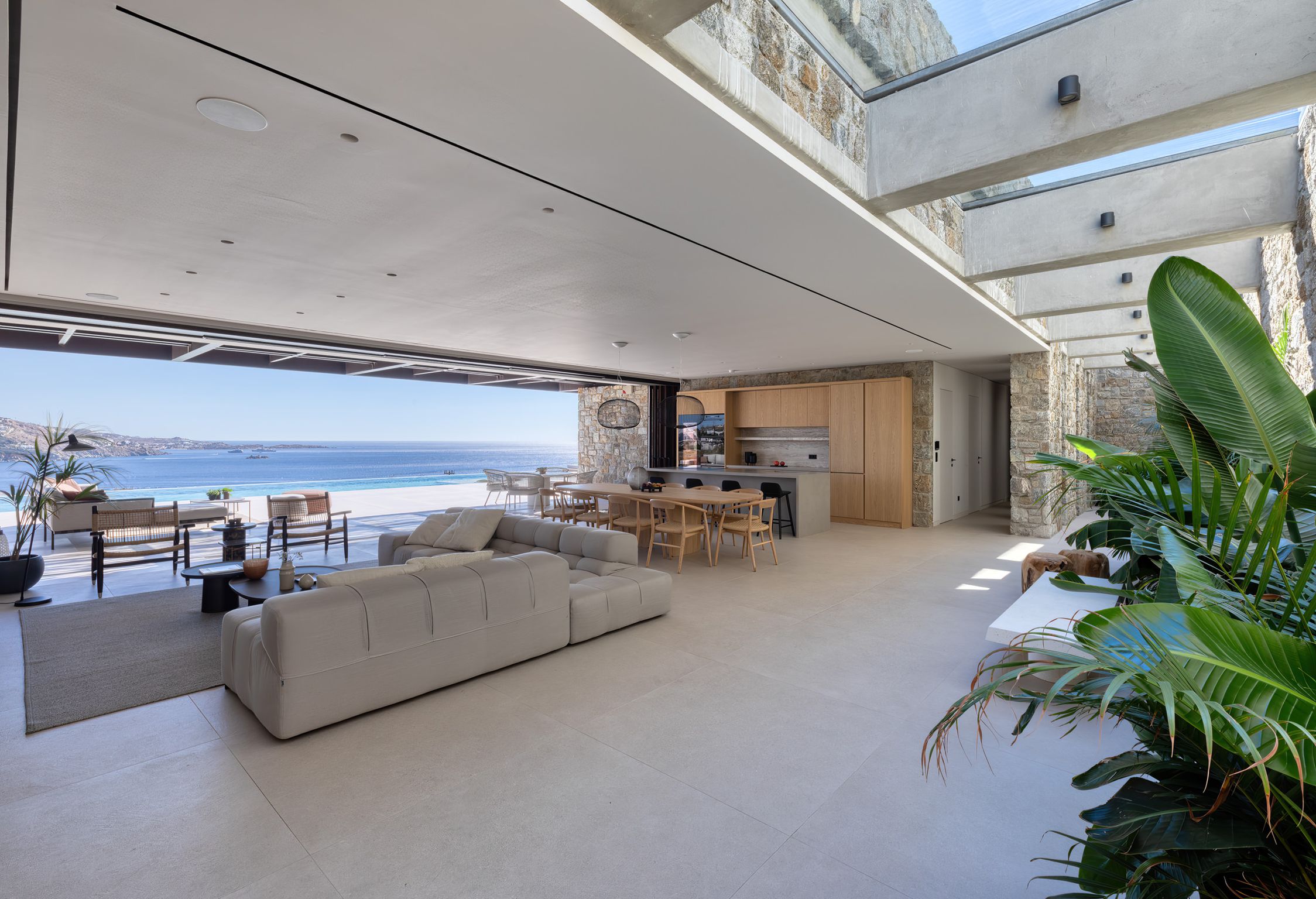 Contemporary living room with sofas and panoramic windows at Aether Private Retreat - Ground Floor, Aleomandra, Mykonos