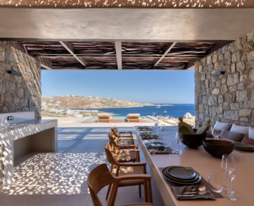 Outdoor dining table with views over the Aegean at Aether Private Retreat - Ground Floor, Aleomandra, Mykonos