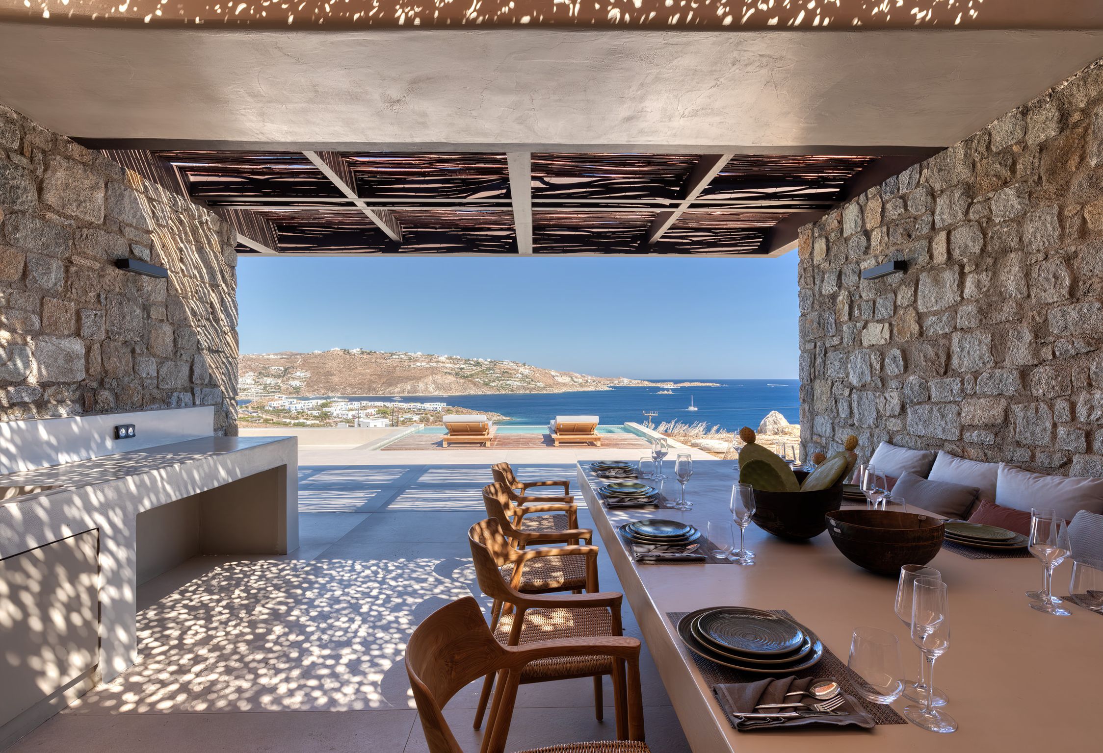 Outdoor dining table with views over the Aegean at Aether Private Retreat - Ground Floor, Aleomandra, Mykonos