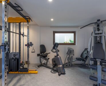 Indoor gym with cardio and weight equipment at Aether Private Retreat - Ground Floor, Aleomandra, Mykonos
