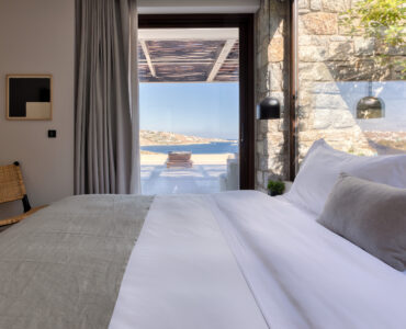 Bedroom with large window and sea view at Aether Private Retreat - Ground Floor, Aleomandra, Mykonos