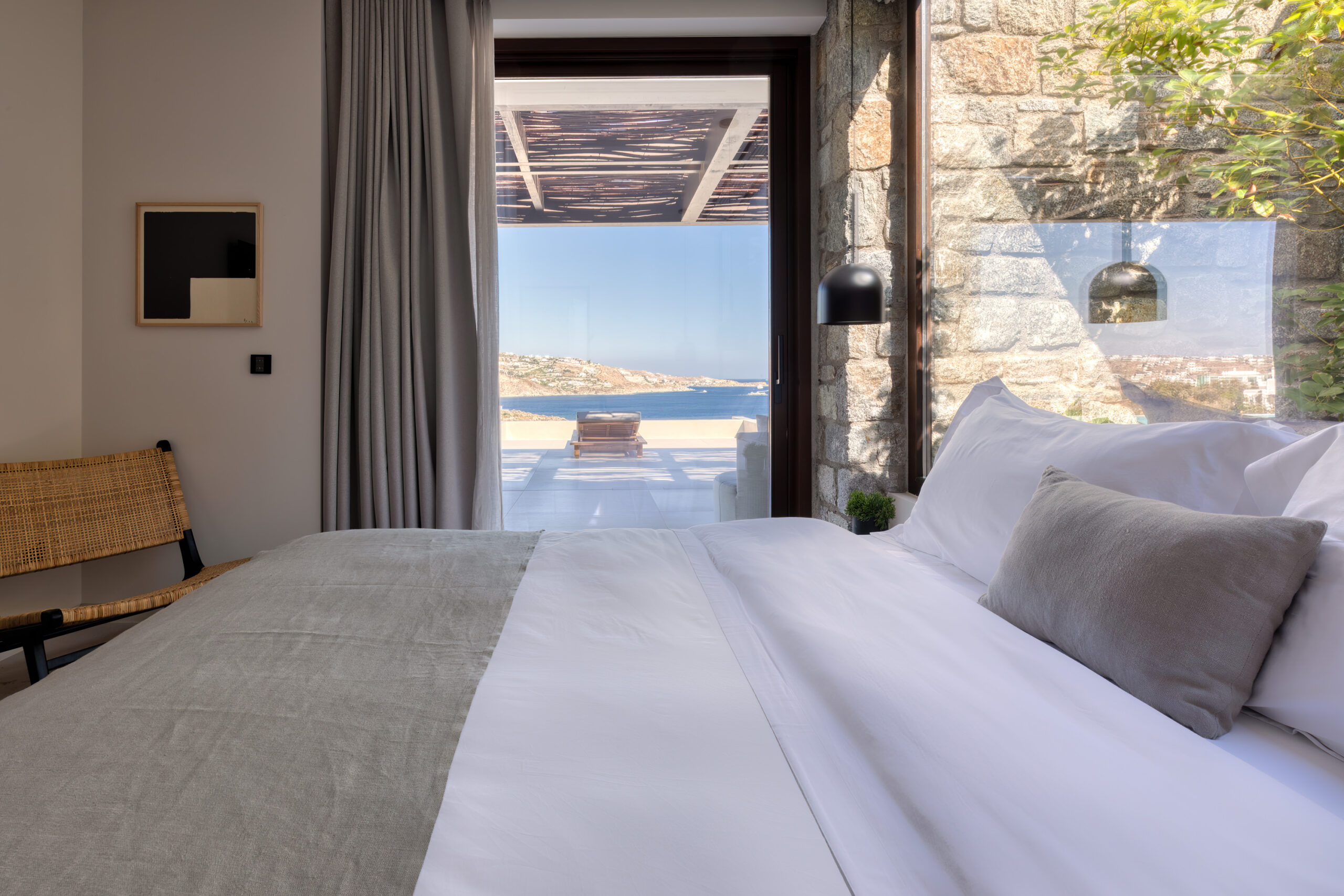 Bedroom with large window and sea view at Aether Private Retreat - Ground Floor, Aleomandra, Mykonos