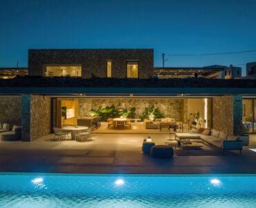 Villa and illuminated pool at night at Aether Private Retreat - Ground Floor, Aleomandra, Mykonos