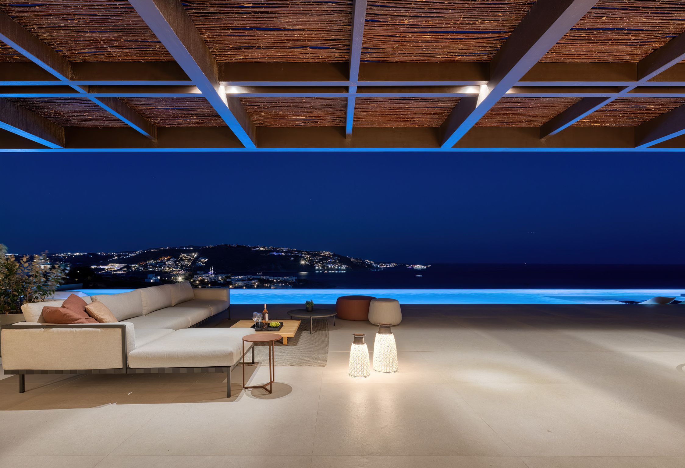 Covered terrace at night overlooking the sea at Aether Private Retreat - Ground Floor, Aleomandra, Mykonos