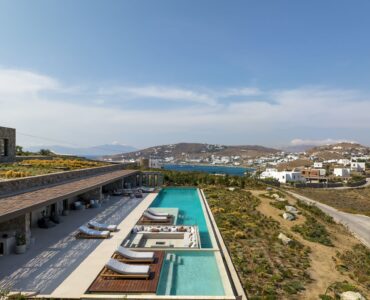 Aerial view of the villa, pools and surrounding Aleomandra landscape at Aether Private Retreat - Ground Floor, Aleomandra, Mykonos