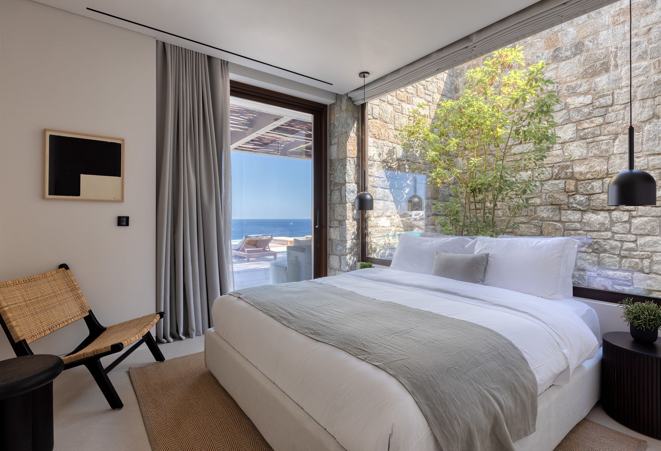 Bedroom with large window and sea view at Aether Private Retreat - Ground Floor, Aleomandra, Mykonos