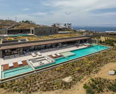 Aerial view of the villa, pools and surrounding Aleomandra landscape at Aether Private Retreat - Ground Floor, Aleomandra, Mykonos