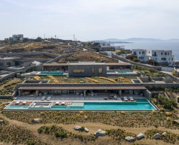 Aerial view of the villa, pools and surrounding Aleomandra landscape at Aether Private Retreat - Ground Floor, Aleomandra, Mykonos