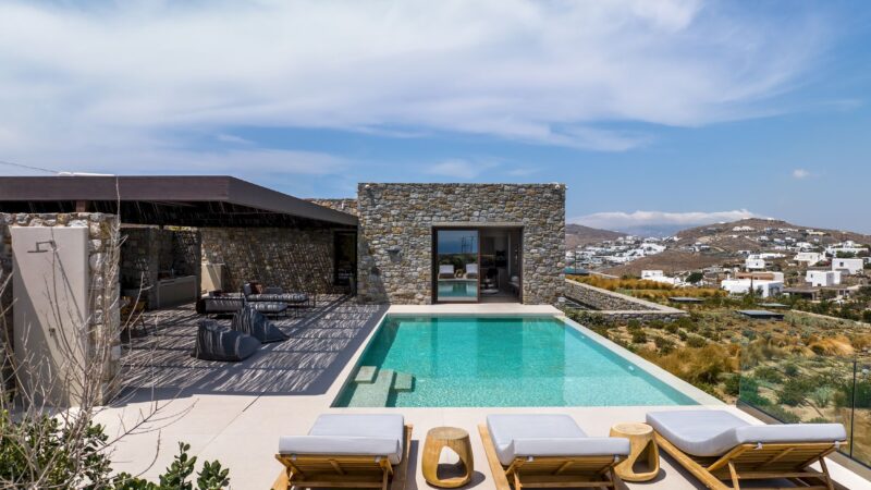 Private pool with sun loungers beside the stone-built villa at Aether Private Retreat - Upper Floor, Aleomandra, Mykonos