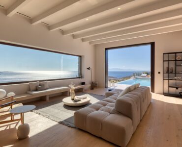 Contemporary living room with sofas and panoramic windows at Aether Private Retreat - Upper Floor, Aleomandra, Mykonos