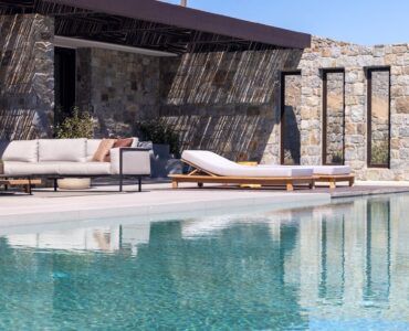Pool terrace with shaded lounge area and sea views at Aether Private Retreat - Upper Floor, Aleomandra, Mykonos