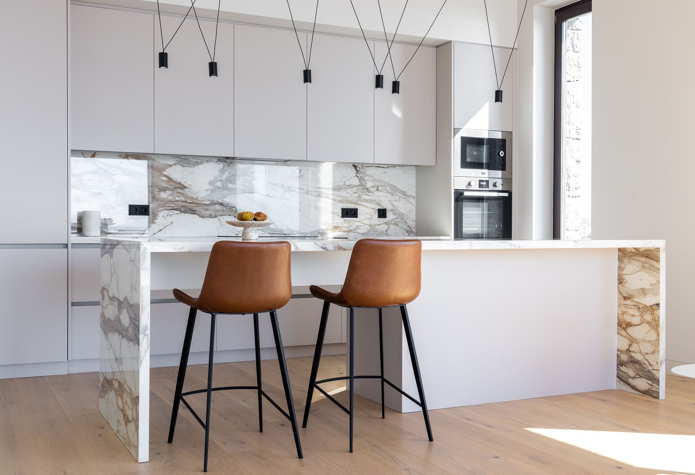 Fully equipped kitchen with island and bar stools at Aether Private Retreat - Upper Floor, Aleomandra, Mykonos