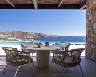 Outdoor dining table with views over the Aegean at Aether Private Retreat - Upper Floor, Aleomandra, Mykonos