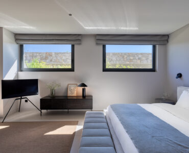 Bedroom with natural textures and soft neutral tones at Aether Private Retreat - Upper Floor, Aleomandra, Mykonos
