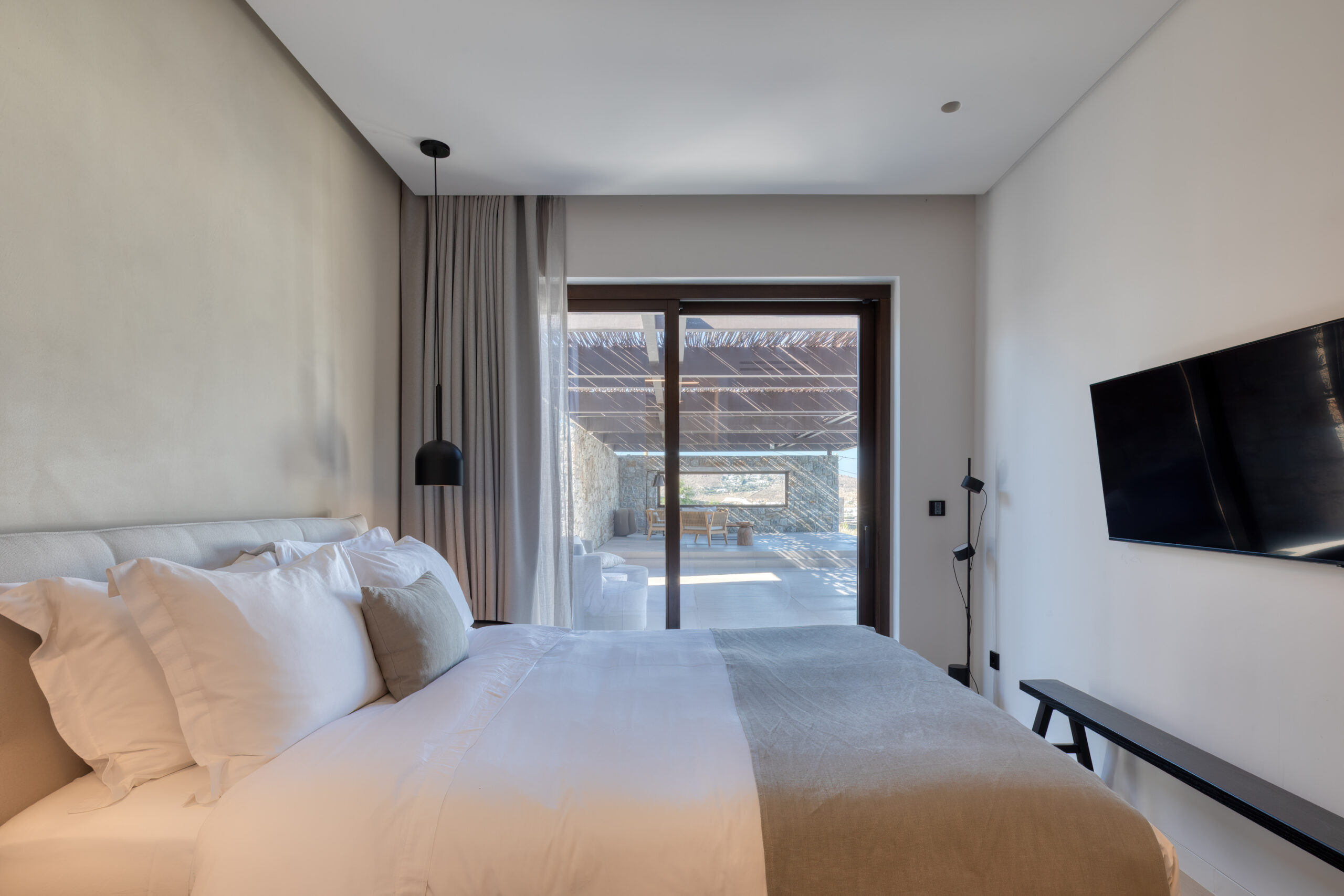 Bedroom with large window and sea view at Aether Private Retreat - Upper Floor, Aleomandra, Mykonos