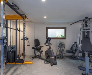 Indoor gym with cardio and weight equipment at Aether Private Retreat - Upper Floor, Aleomandra, Mykonos
