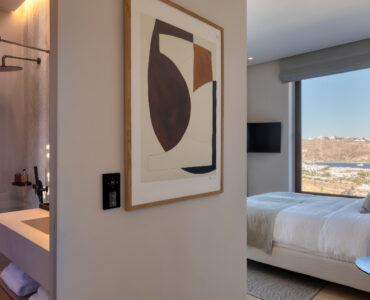 Bedroom with natural textures and soft neutral tones at Aether Private Retreat - Upper Floor, Aleomandra, Mykonos