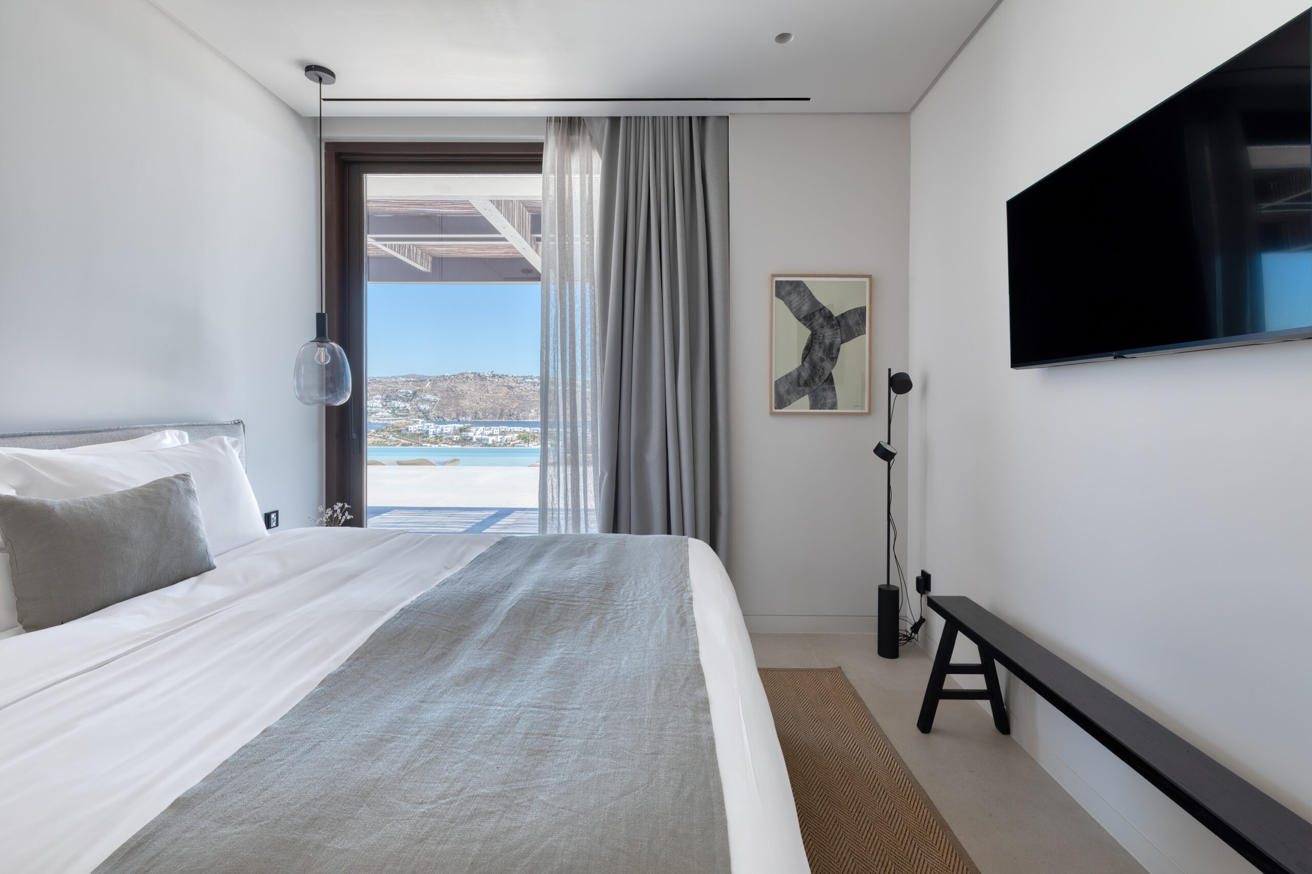Bedroom with large window and sea view at Aether Private Retreat - Upper Floor, Aleomandra, Mykonos