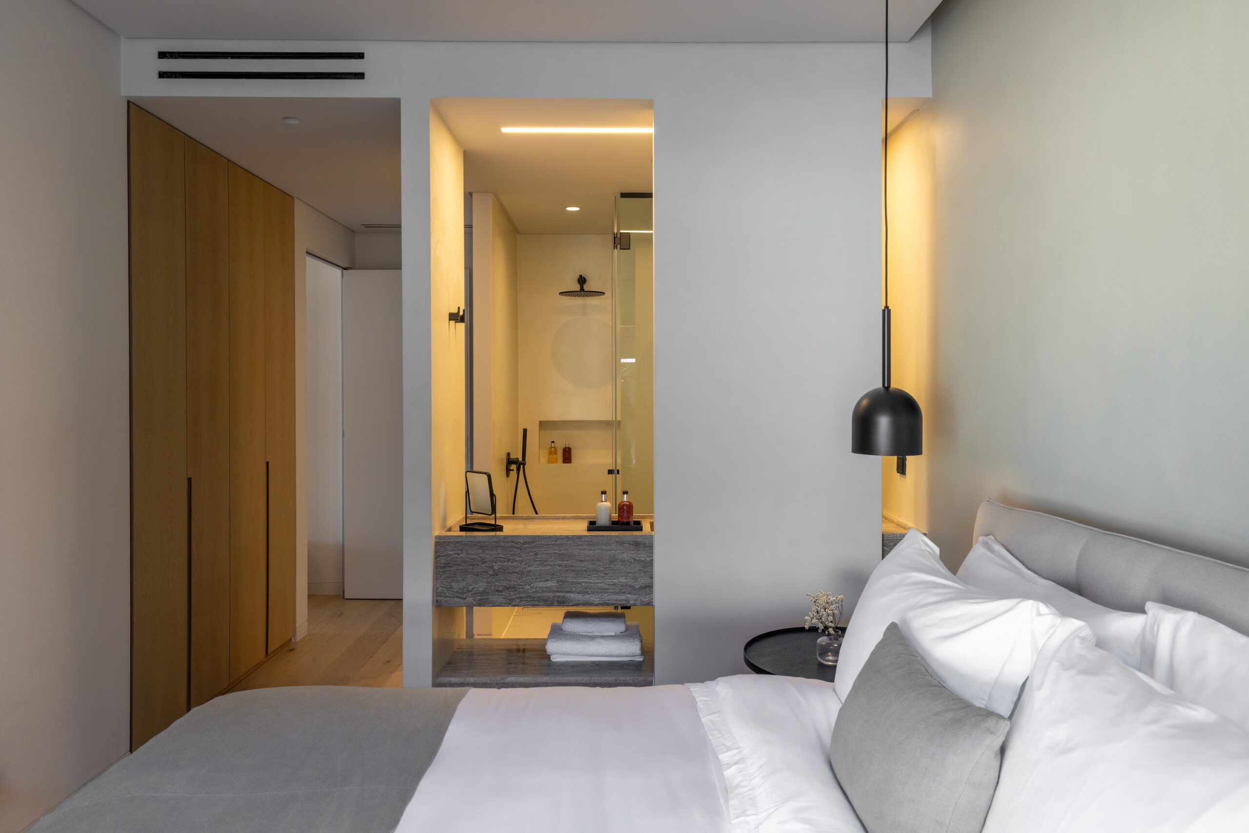 Bedroom with natural textures and soft neutral tones at Aether Private Retreat - Upper Floor, Aleomandra, Mykonos