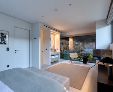 Bedroom with open en-suite bathroom at Aether Private Retreat - Upper Floor, Aleomandra, Mykonos