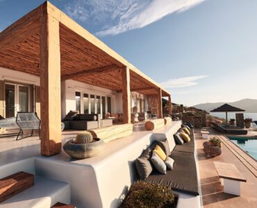 Shaded veranda lounge facing the Aegean Sea (view 2) at Bali Sea Front Villa in Ftelia, Mykonos