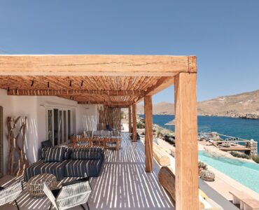 Shaded veranda lounge facing the Aegean Sea (view 3) at Bali Sea Front Villa in Ftelia, Mykonos