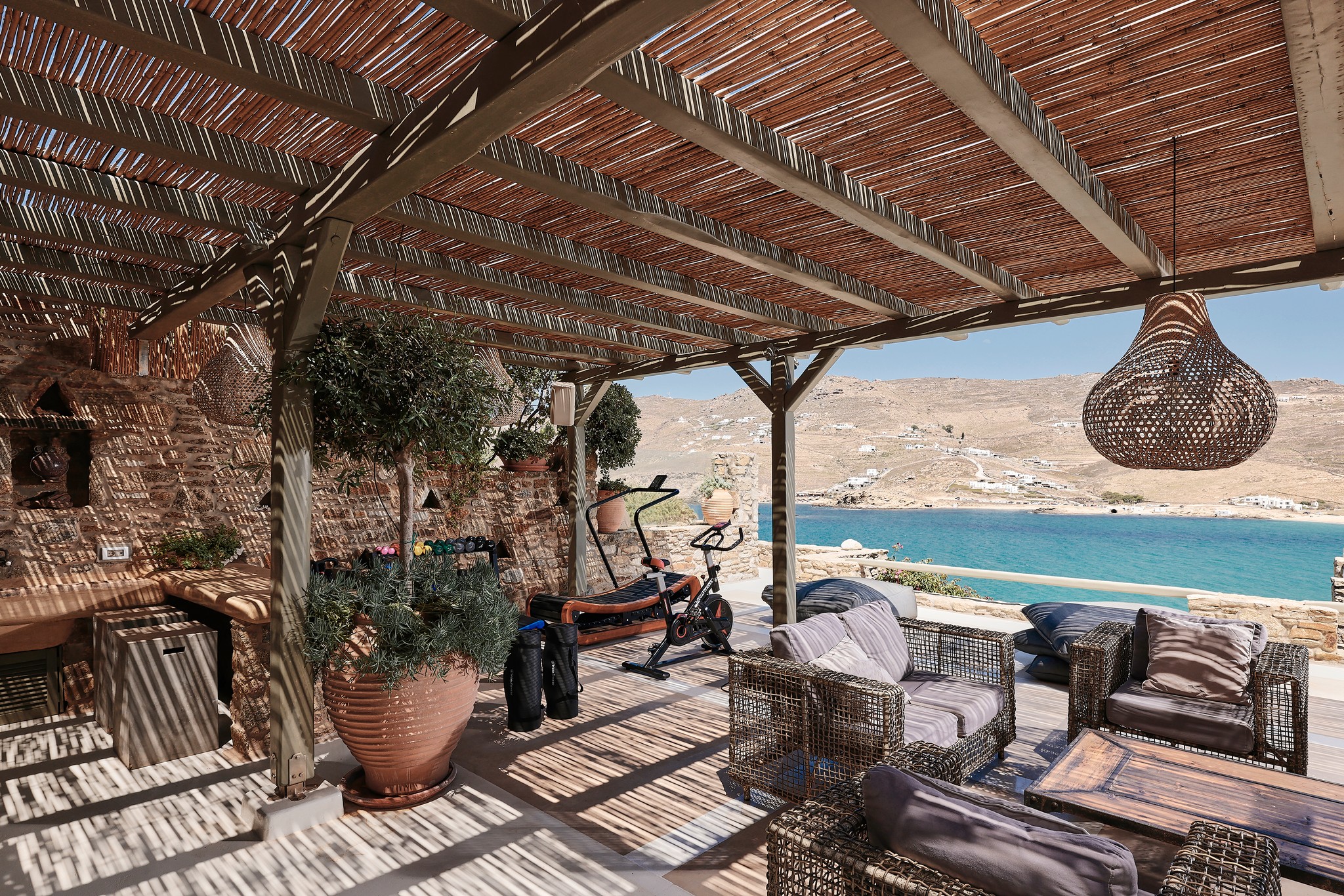 Outdoor gym area with sea views at Bali Sea Front Villa in Ftelia, Mykonos