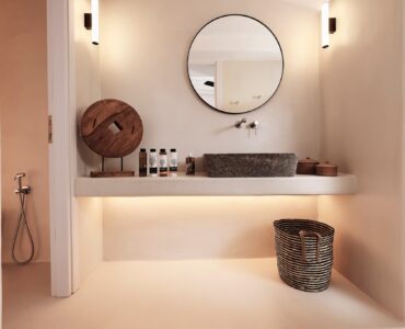 Master bedroom on the upper level of the main house (view 5) at Bali Sea Front Villa in Ftelia, Mykonos